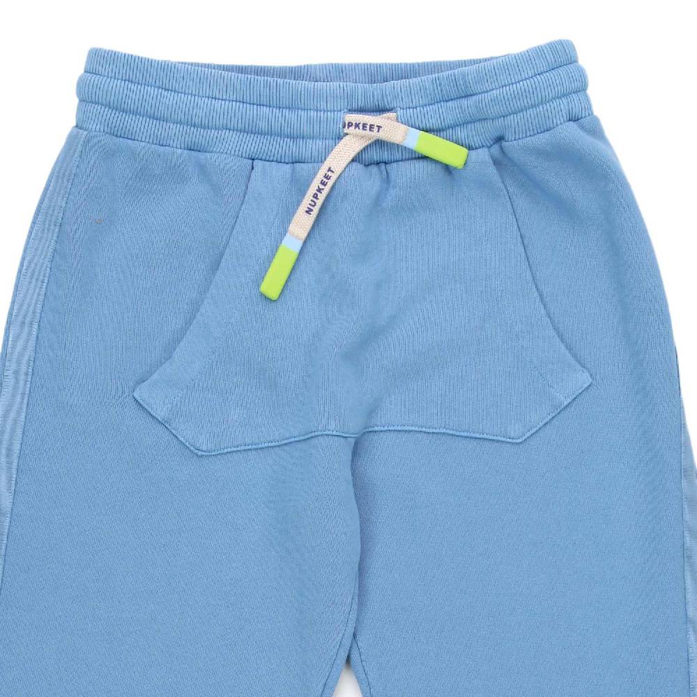 Nupkeet Pantalone Pemba indaco con marsupio Moda