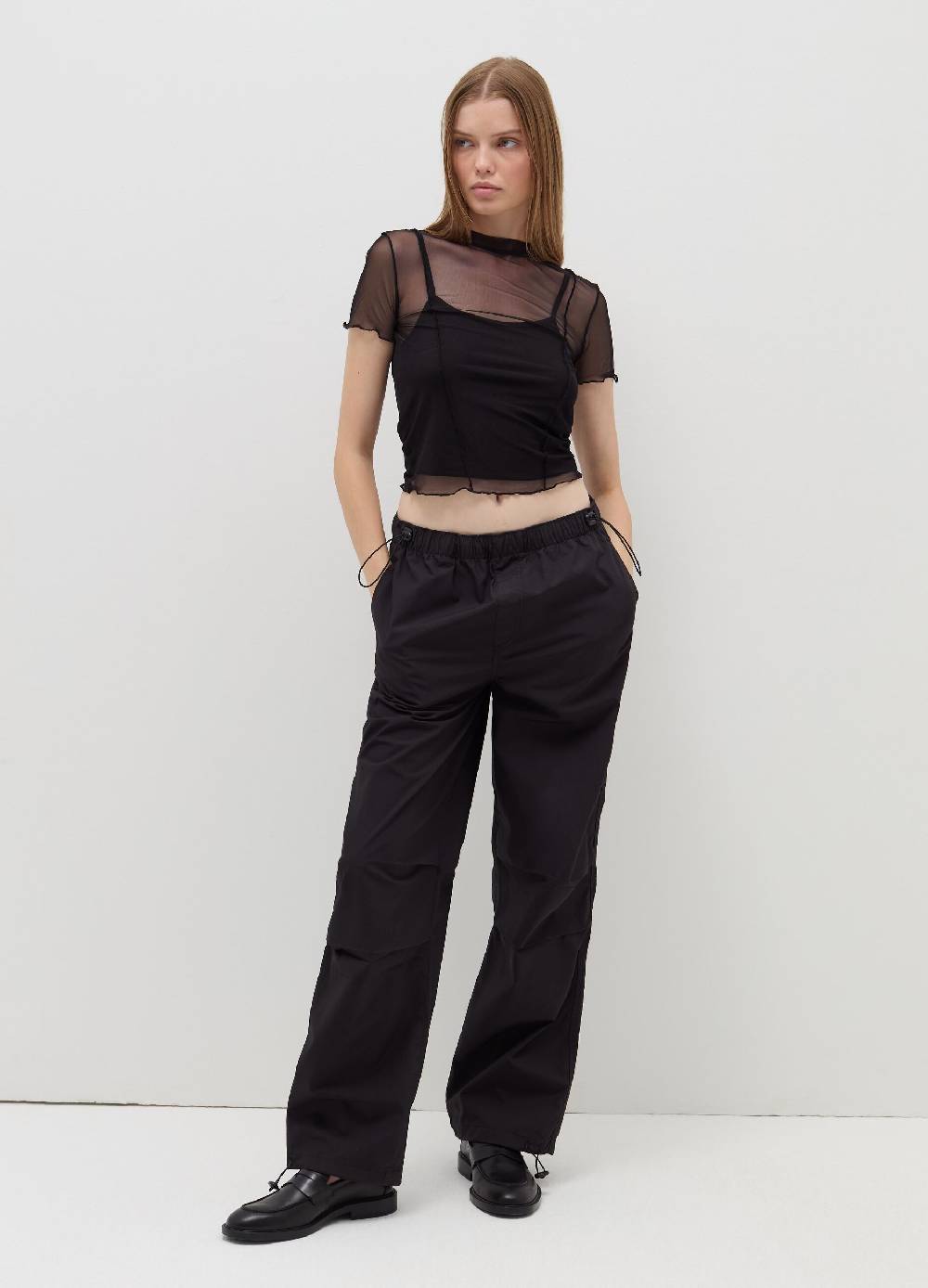 B. ANGEL T-shirt crop in mesh con profili ondulati Novità