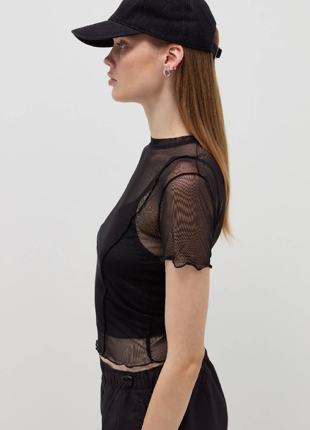 B. ANGEL T-shirt crop in mesh con profili ondulati Novità