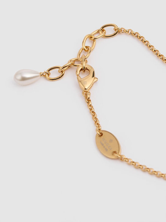 Luisaviaroma Bracciale a catena GG Marmont in ottone con charm Outlet